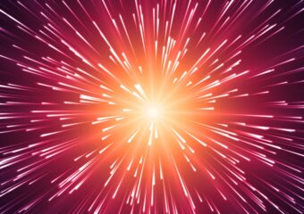Digitally generated image of rays of light expanding from a central point, against a red and orange background, in a starburst appearance.
